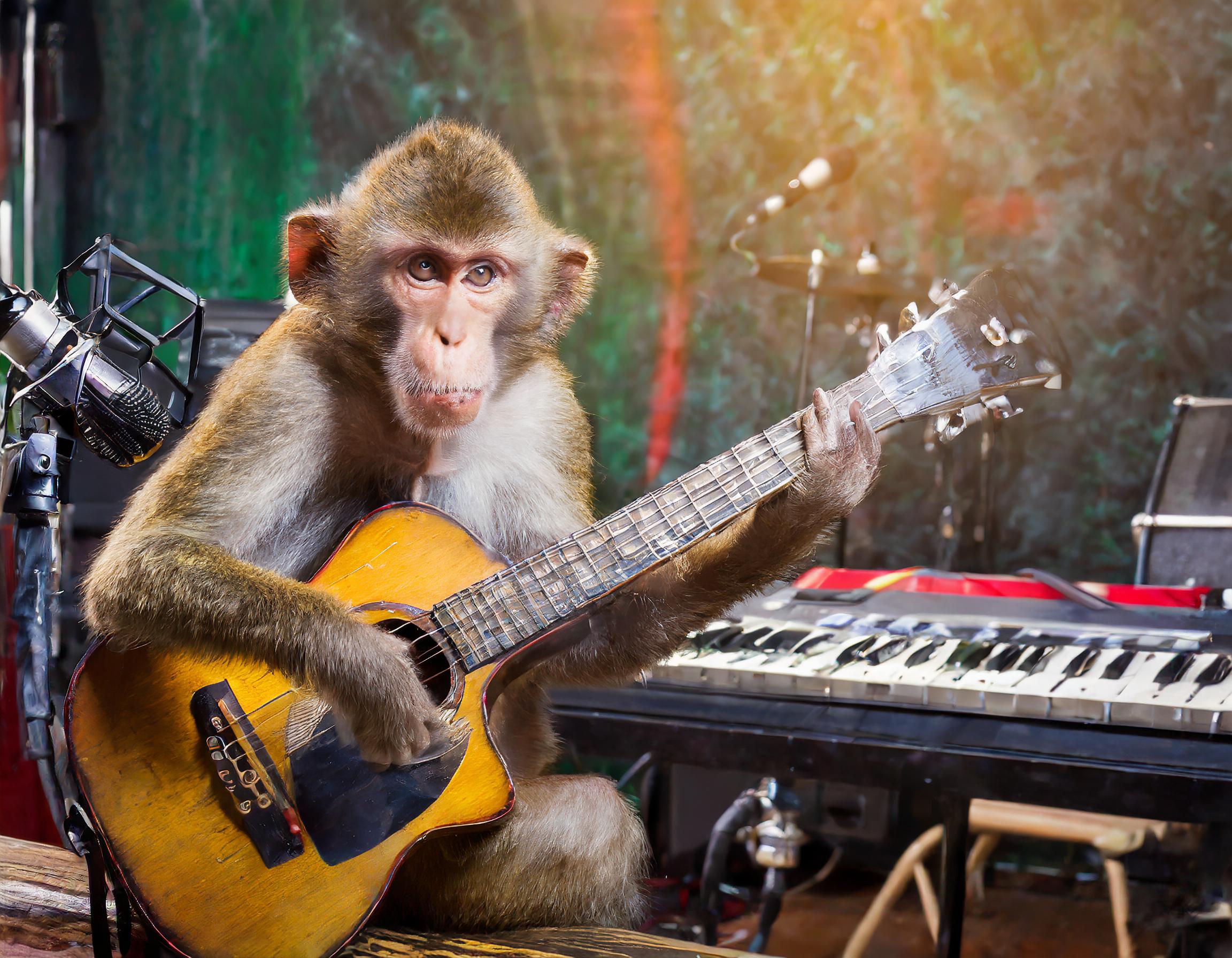 Monkey playing guitar in a recording studio. Image generated by Adobe Firefly A.I.