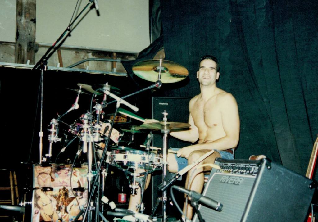 Matt Beeson in an older picture. Matt might be 25 years old or so in this pic. He plays drums shirtless live at Howlin Wolf in New Orleans in the 90's