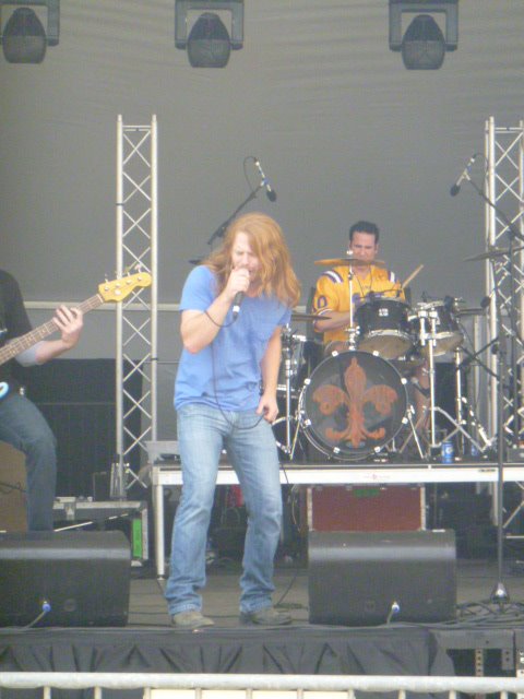 Adam Pearce singing at Gretna Fest live some years ago. Matt Beeson drumming in the background