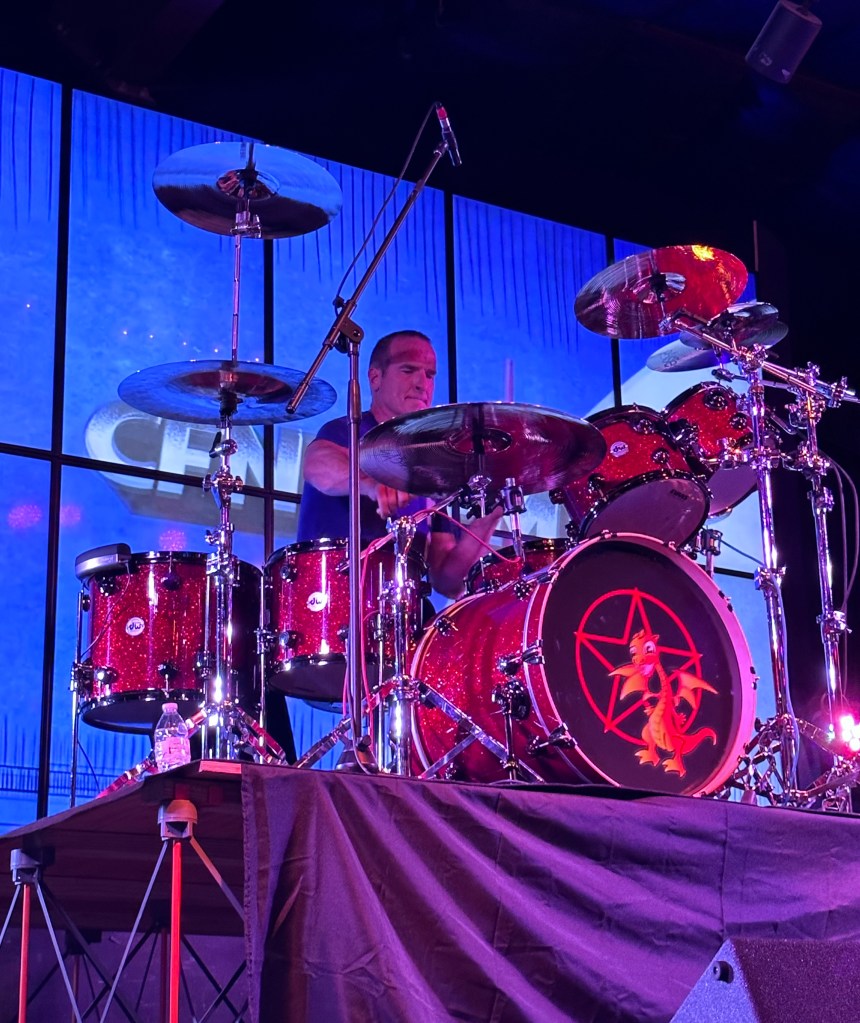 Matt Beeson drumming live, shot with an up perspective